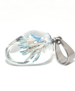 Hanger implosie kleur met zand of as